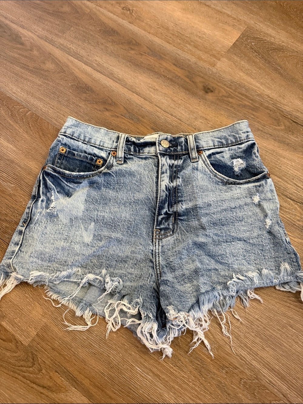 High-Rise Light Blue Distressed Denim Shorts